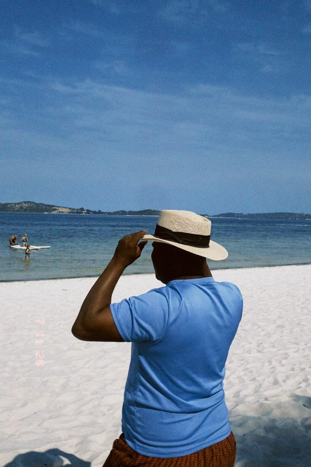 A traveller taking in the ocean view